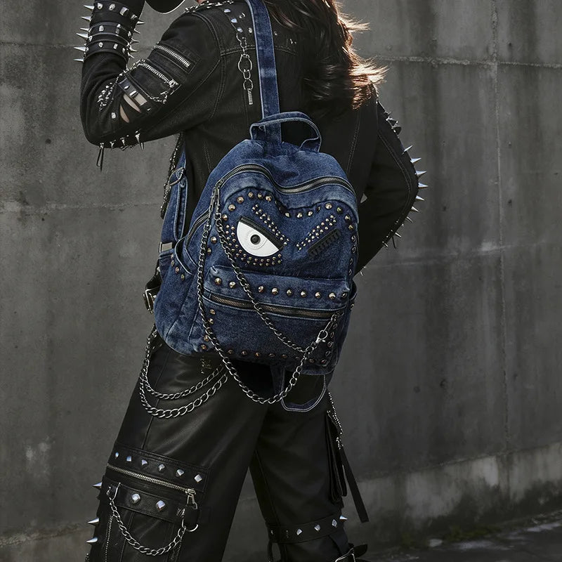 Women Punk Backpack Denim Rivet School Bag with Big Eye Design Chain Detail Grunge Goth Style Casual Travel Daypack Rucksack